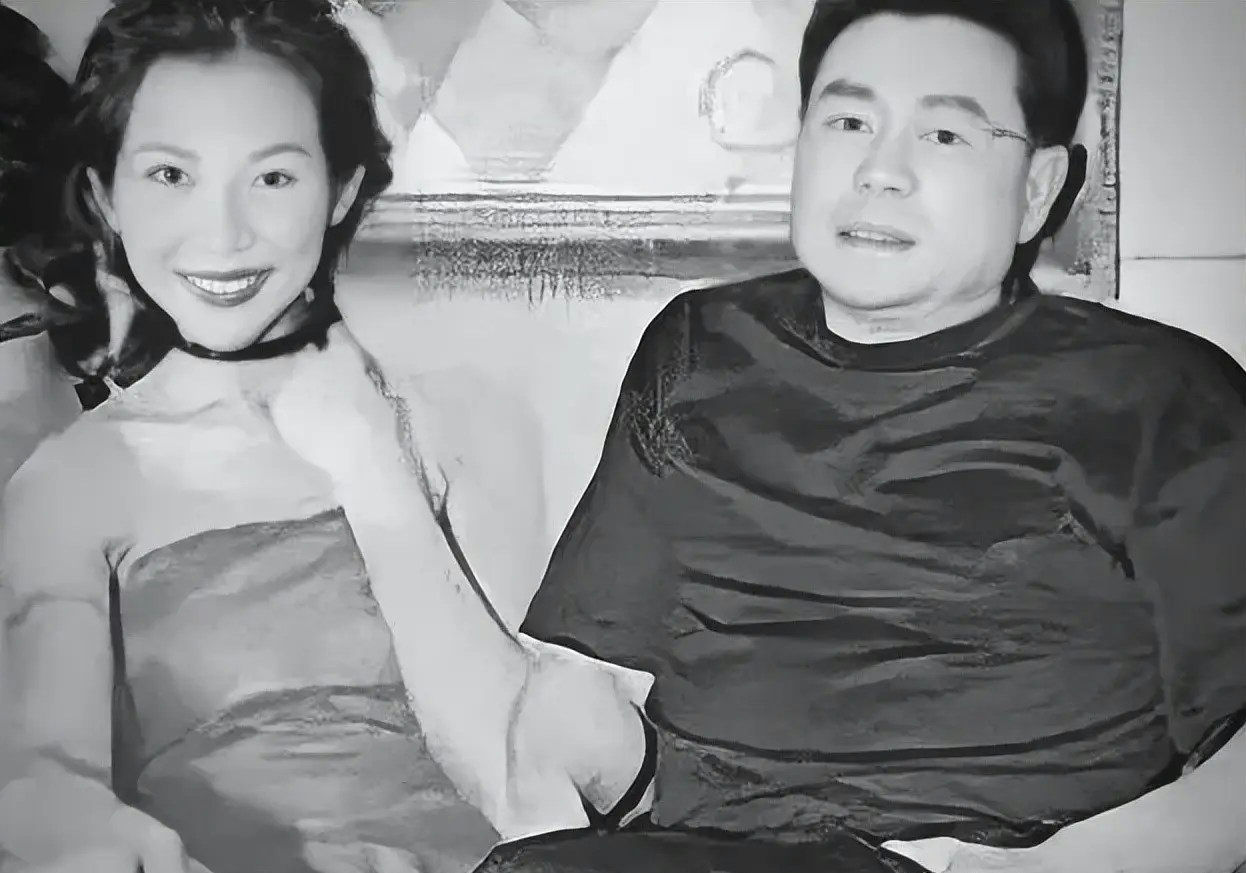 Ada Choi sold to tycoon forced relationshippeople' 'couch' 'smiling' 'monochromatic' 'together.