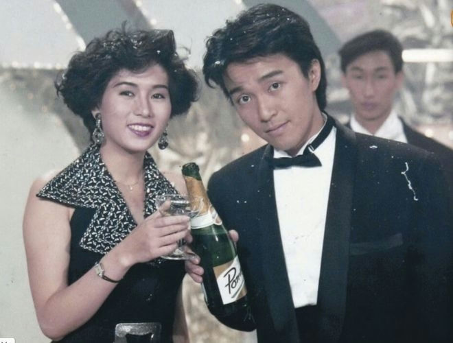 Stephen Chow Luo Huijuan love storypeople' 'toast' 'black' 'tie' 'evening' 'wear' 'champagne.