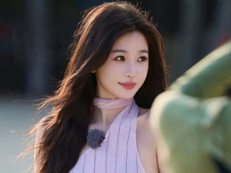 Esther Yu scandalwoman' 'hair' 'scarf' 'jewelry' 'outdoors.