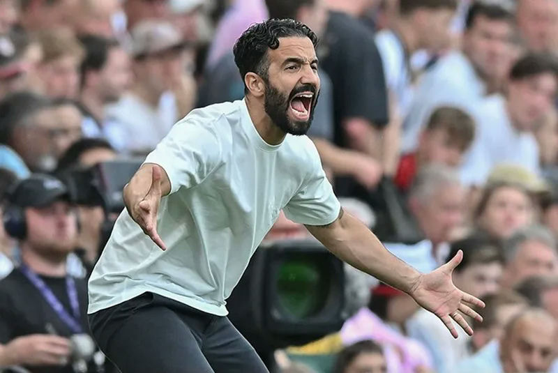 Ruben Amorim Manchester United sacking rumorsman' 'shouting' 'arms' 'extended' 'beard' 'crowd.