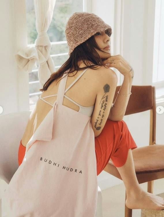 Lee Hyori Ananda yoga studiopeople' 'woman' 'hat' 'tattoo' 'indoors.