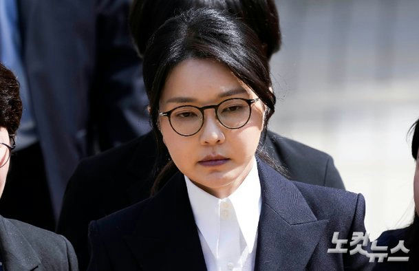 Kim Keon-hee indicted in custodypeople' 'woman' 'glasses' 'suit' 'serious.