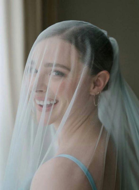 Chloë Grace Moretz Kate Harrison weddingperson' 'bride' 'veil' 'smiling' 'earring.