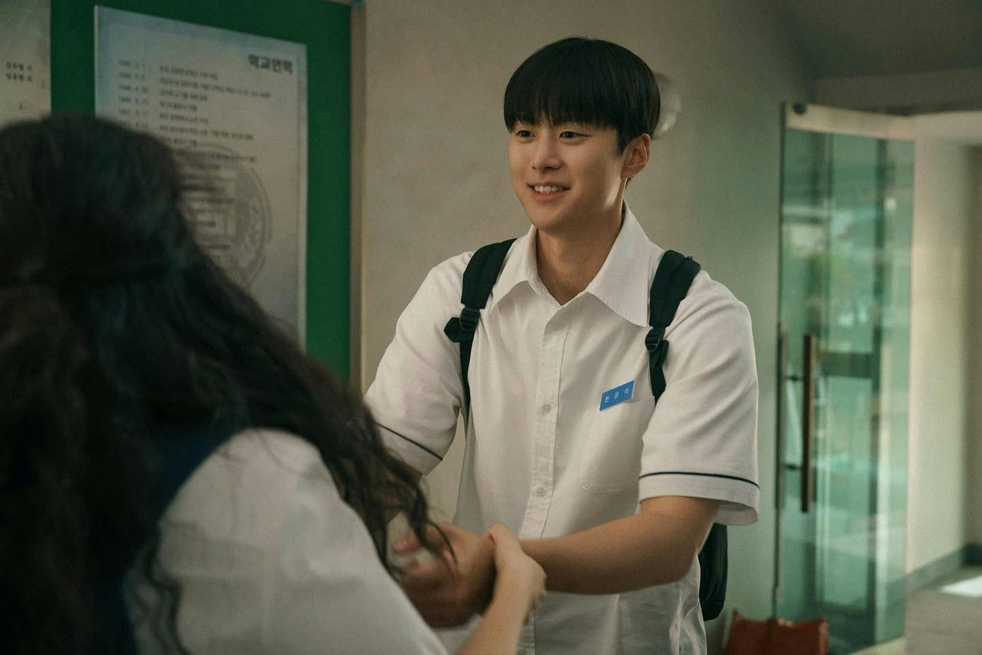 Love Untangled Reviewpeople' 'student' 'holding' 'hands' 'smiling' 'backpack.