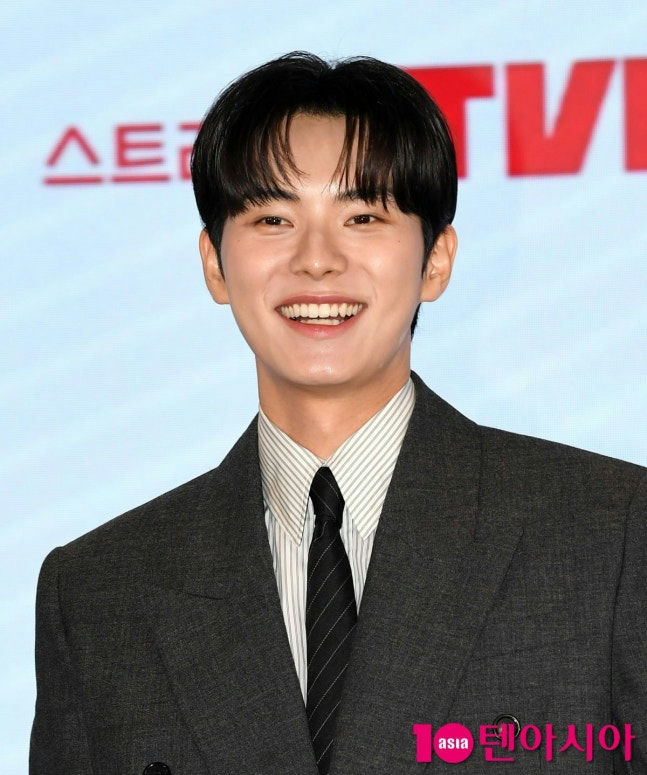 successful K-drama casting replacementsperson' 'smiling' 'suit' 'tie' 'handsome.