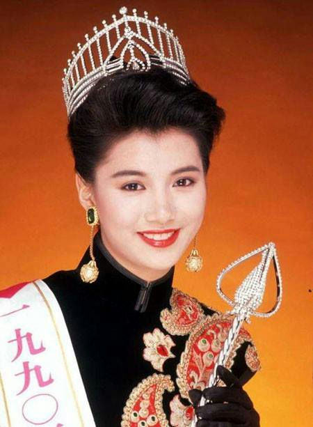 Anita Yuen Julian Cheungperson' 'crown' 'beauty' 'pageant' 'sash' 'regalia.