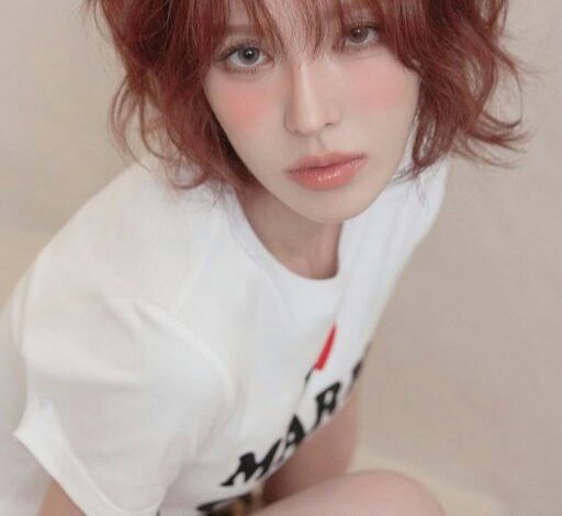 Wendy solo sales after SM Entertainmentwoman' 'portrait' 'red' 'hair' 't' 'shirt' 'blush.