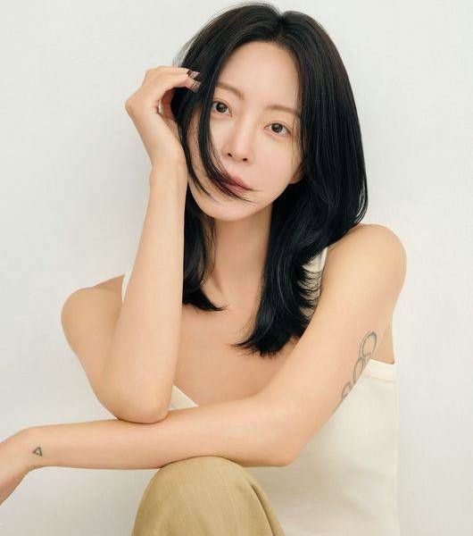 Han Ye Seul comeback 2026woman' 'portrait' 'tattoos' 'tanktop' 'brunette.