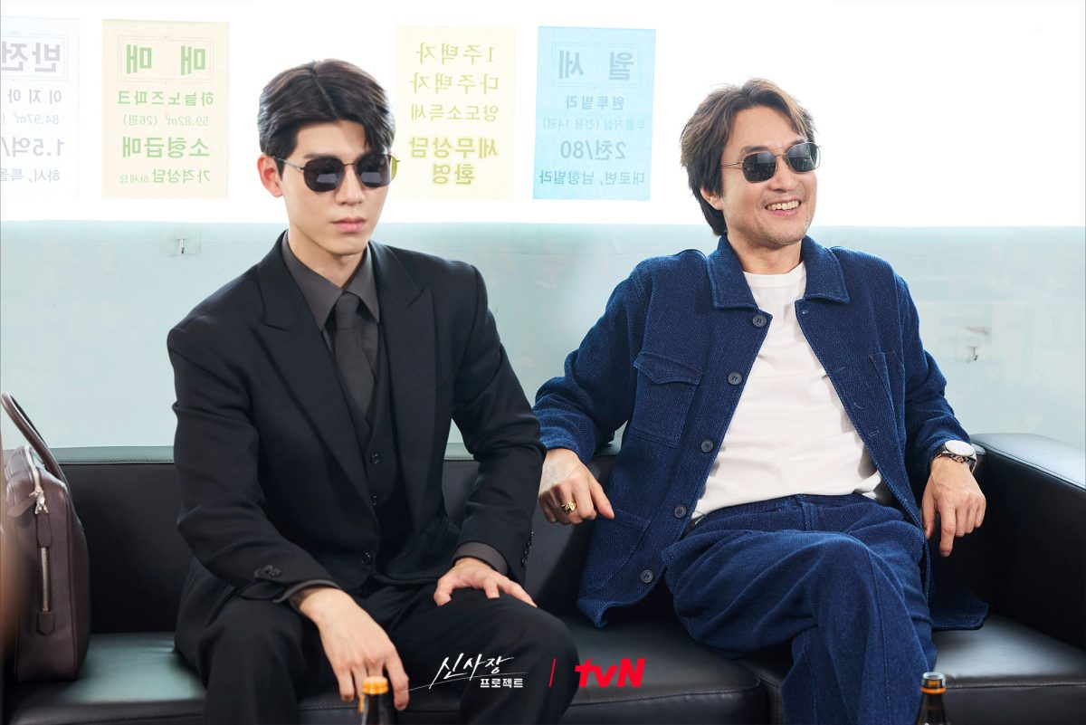 Han Suk Kyu Shin's Project ratingsmen' 'sunglasses' 'suit' 'relaxing' 'couch.