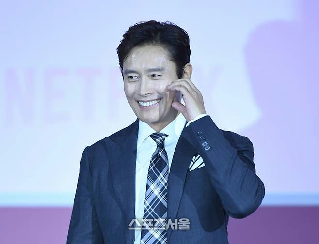Lee Byung Hun career versatilityman' 'smiling' 'suit' 'tie' 'formal.