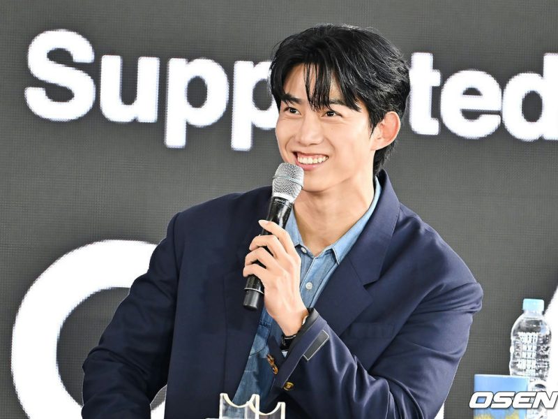 Greg Hsu Ok Taecyeon BIFF 2025person' '' 'k' '' 'aecyeon' 'microphone' 'navy' 'blazer' 'denim' 'shirt.