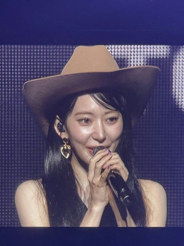 LE SSERAFIM Sakura unedited photoswoman' 'cowboy' 'hat' 'microphone' 'earrings' 'singing.