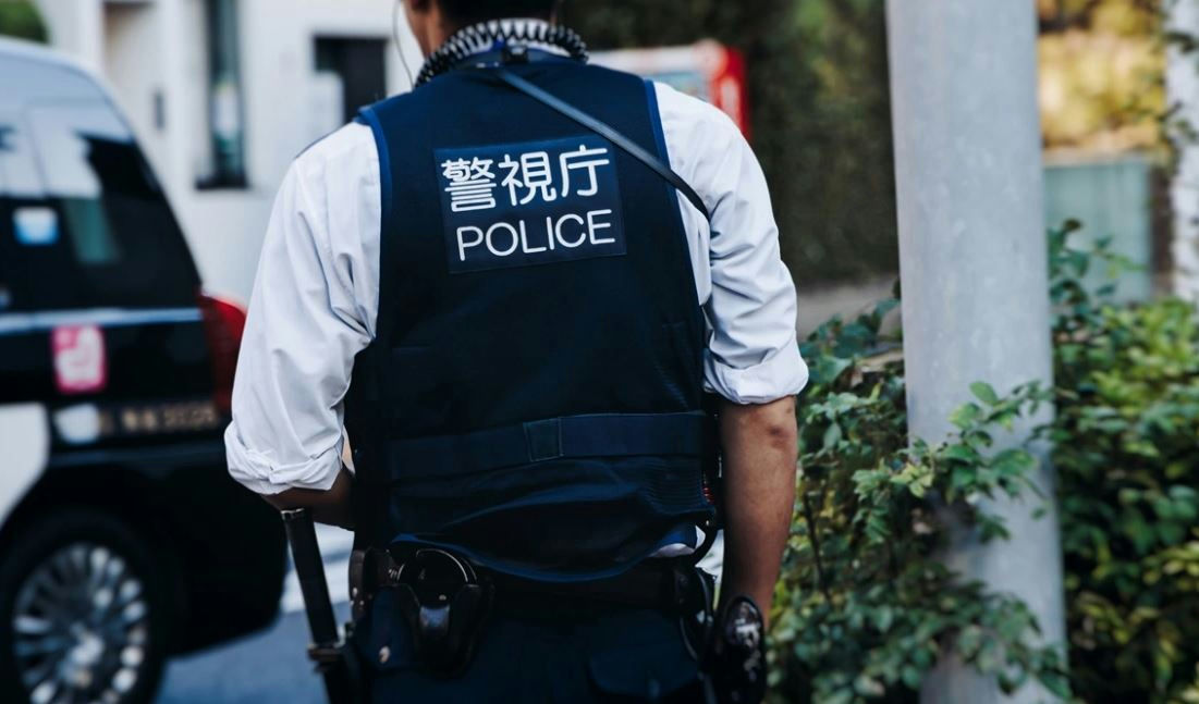 Japanese mother keeps daughter’s body in freezer for 20 yearsperson' 'police' 'uniform' 'street' 'equipment.