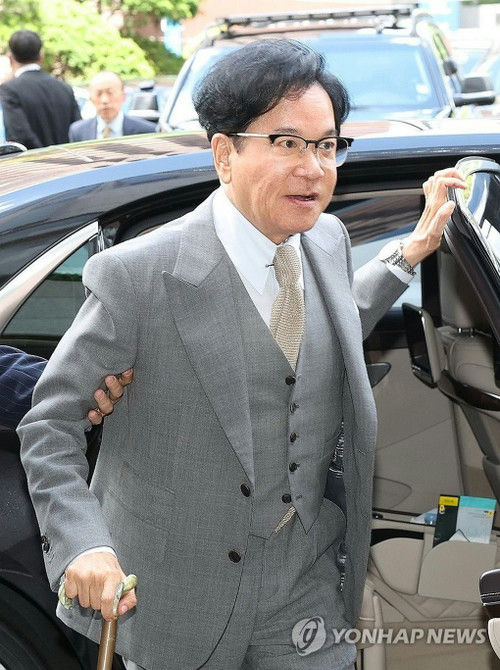 CJ Chairman Lee Jae Hyun scandalpeople' 'man' 'suit' 'car' 'glasses.