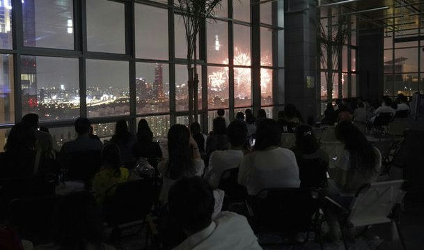 HYBE Family Night 2025people' 'indoor' 'fireworks' 'cityscape' 'window.