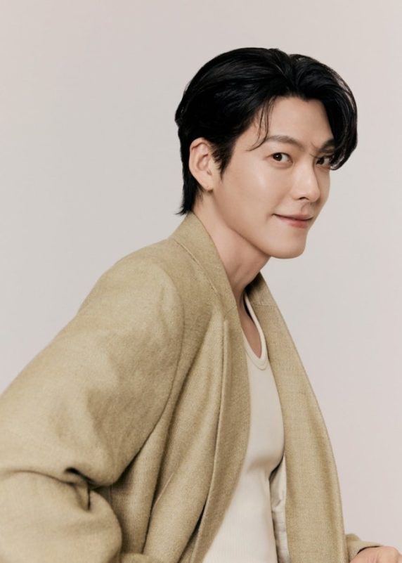 Kim Woo-bin variety show appearanceperson' 'beige' 'coat' 'smiling' 'smooth' 'skin' 'black' 'hair.