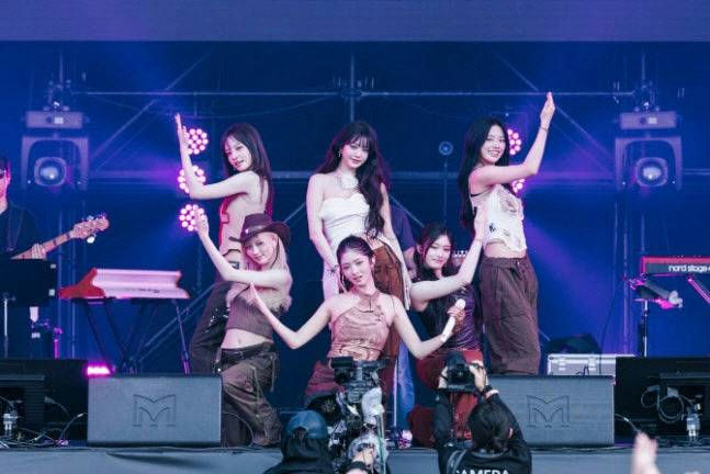 IVE Starship trademark disputepeople' 'stage' 'performance' 'singing' 'audience.