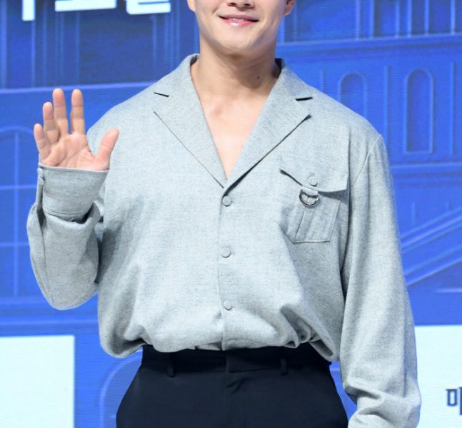 Kim Jong Kook newlywed first updateperson' 'smiling' 'waving' 'collared' 'shirt' 'black' 'pants.