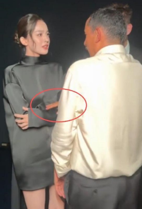 Gülnezer Bextiyar Paris Fashion Week harassmentpeople' 'talking' 'dress' 'shirt' 'hand.