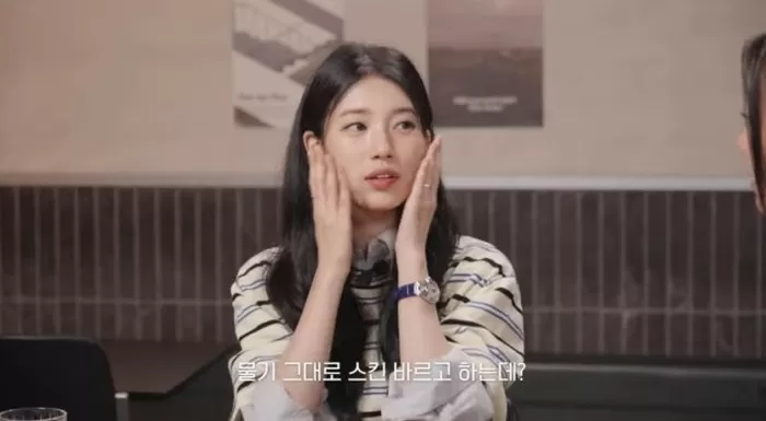Suzy skincare routine no towelspeople' '' 'uzy' 'hands' 'striped' 'shirt' 'watch.