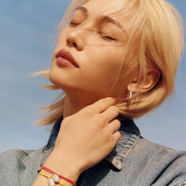 Felix Louis Vuitton private jetperson' 'portrait' 'blonde' 'eyesclosed' 'bracelet.