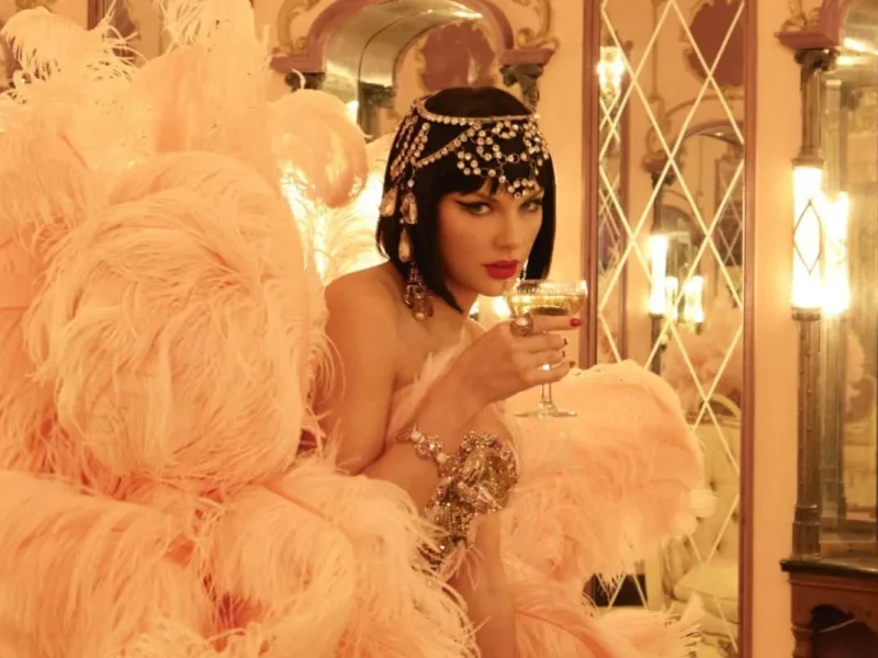 Kayla Nicole Taylor Swift Travis Kelcepeople' 'woman' 'feathers' 'champagne' 'jewelry.