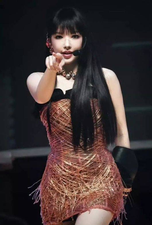 ChengXiao plastic surgery rumorsperson' 'pointing' 'dress' 'microphone' 'bangs.