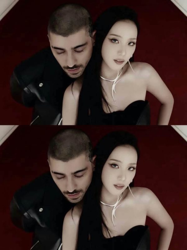 people-two people-A-man with buzz cut-A-woman with long dark hair-B-black clothing-C-white unique necklace