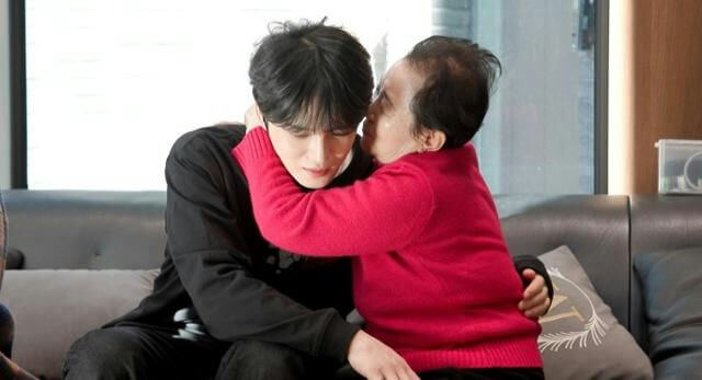 people-young man-A-older woman-A-embrace-B-kiss on cheek-C-comfort
