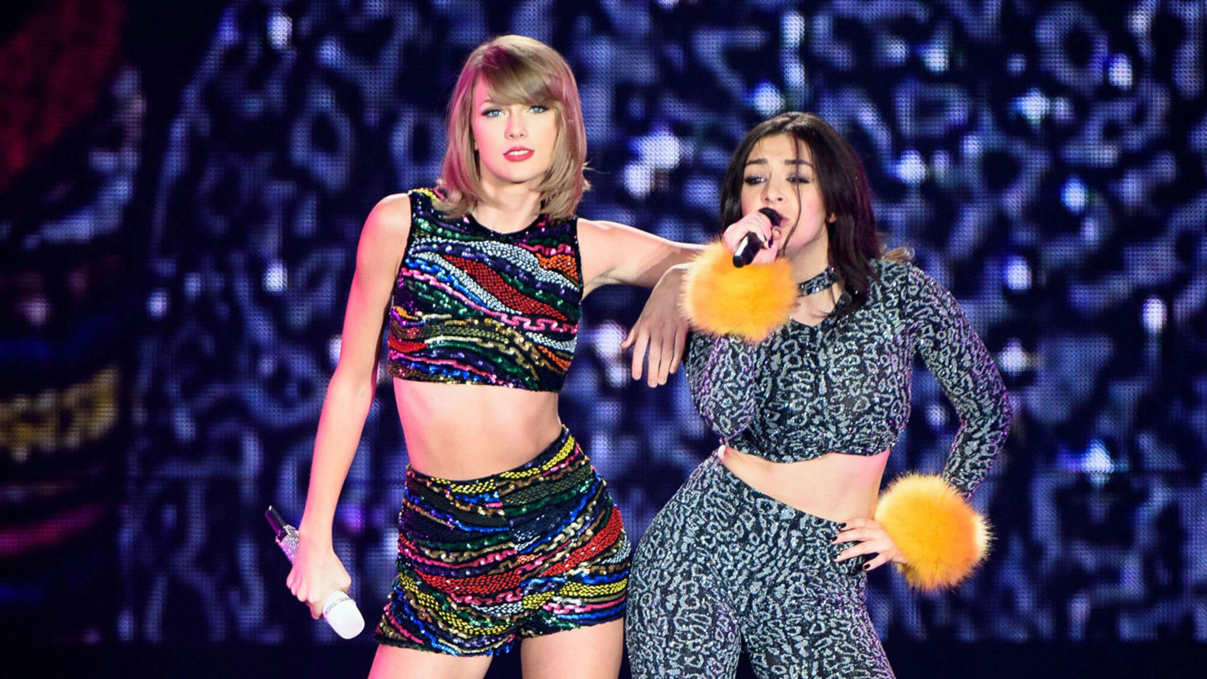 people-Taylor Swift-A-Charli XCX-A-performance-A-sequined crop top and shorts-B-leopard print outfit-B-fur cuffs-C