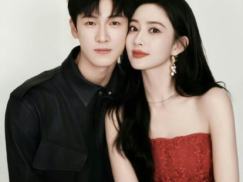 people-A-man-A-woman-A-couple-A-studio-portrait-A-black-leather-jacket-A-red-strapless-dress-A-long-dark-hair