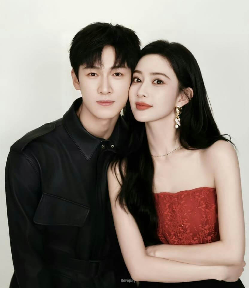 people-A-man-A-woman-A-couple-A-studio-portrait-A-black-leather-jacket-A-red-strapless-dress-A-long-dark-hair