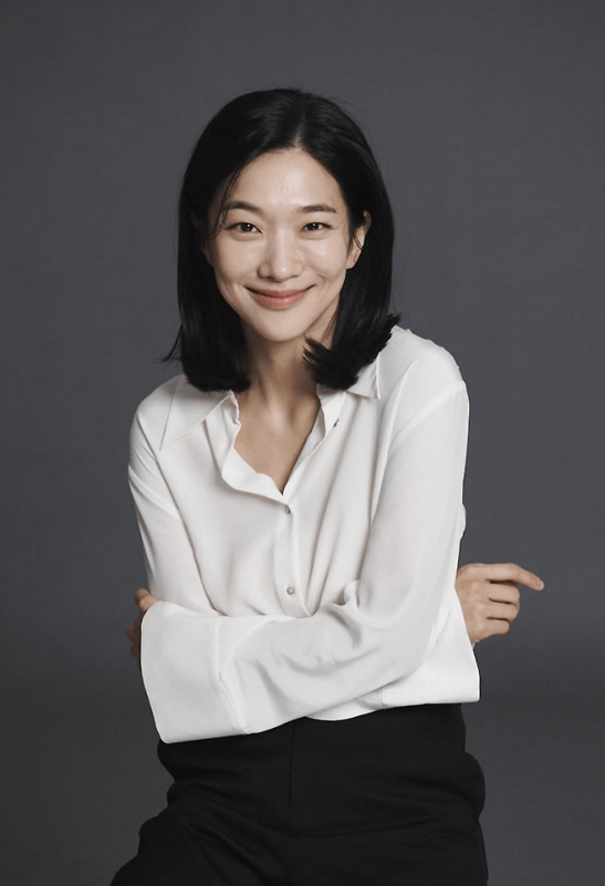 people-woman-Asian-smiling-medium-length-black-hair-white-collared-shirt-black-pants