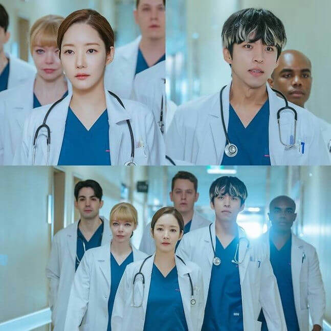 people-medical professionals-A-doctors-A-hospital setting-A-uniforms-B-stethoscopes-B-serious expressions-C-group portrait-C
