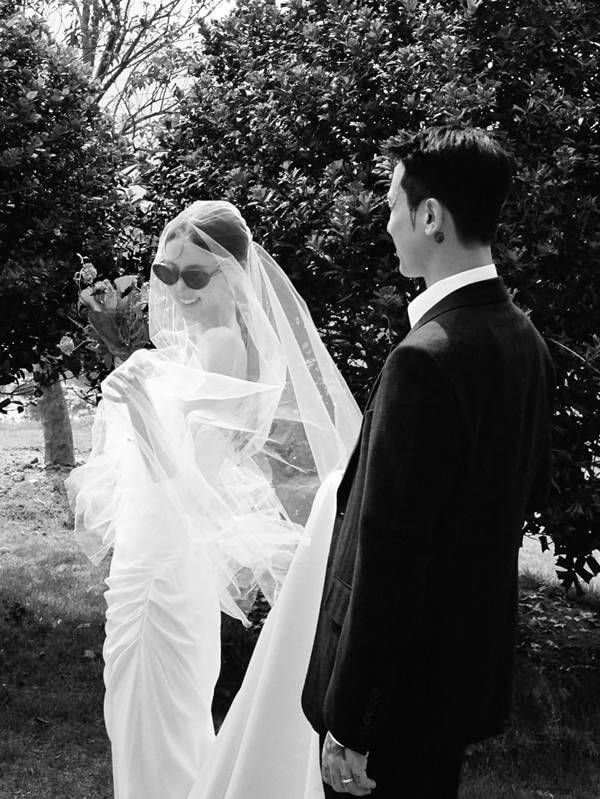 people-bride and groom-A-wedding attire-B-sunglasses on bride-C-outdoor setting