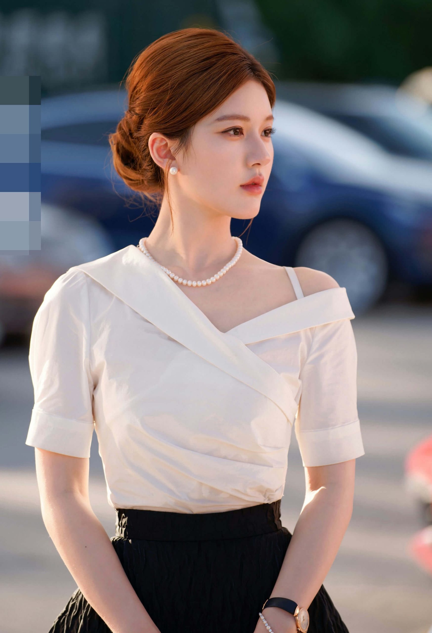 people-woman-A-elegant-A-pearl-jewelry-A-white-top-A-black-skirt