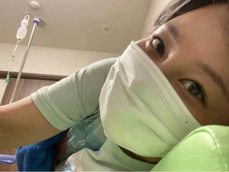 people-1-woman-A-hospital-A-IV-drip-A-face-mask