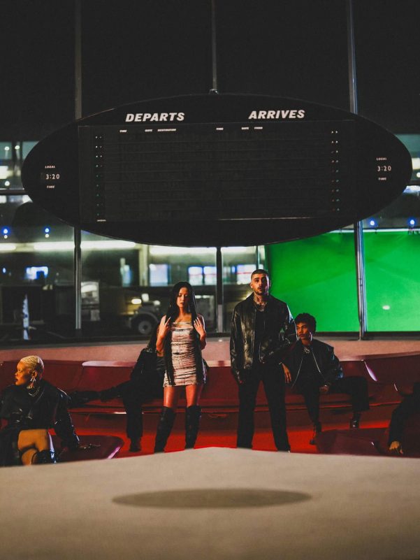 people-4-airport departure board-A-dark lighting-A-fashionable attire-A-green screen background-B-standing-B-sitting-C-posing