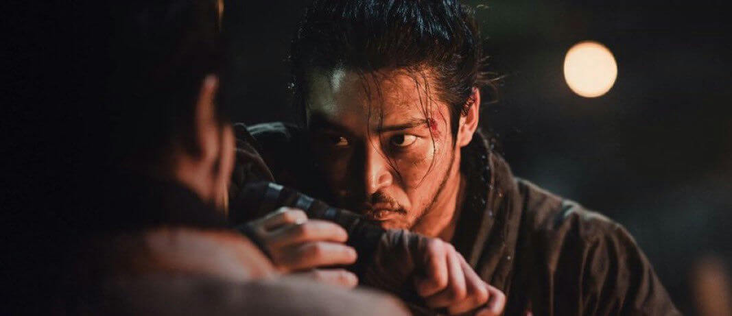 people-One man-A-intense gaze-A-sweaty forehead-B-bloody cheek-C-dark background