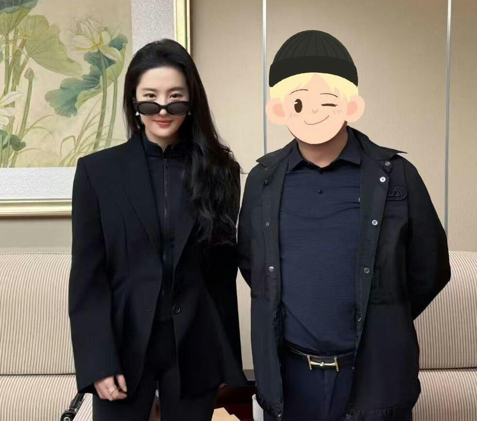 people-woman-all-black-attire-A-sunglasses-A-long-dark-hair-B-man-face-obscured-B-black-beanie-C-black-jacket