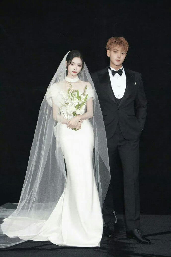 people-A-bride-A-groom-B-wedding dress-B-tuxedo-C-black background