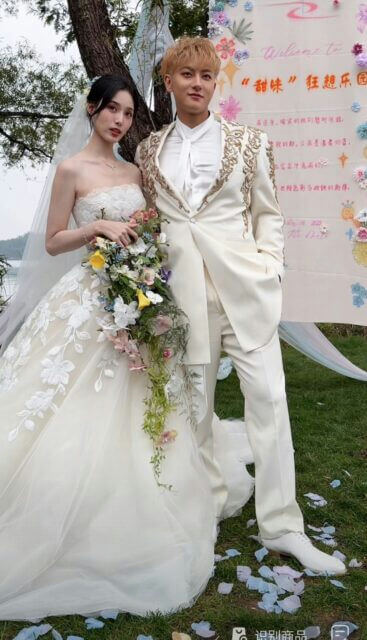people-A-bride-A-groom-A-wedding-A-outdoor-A-white-suit-A-wedding-dress-A-bouquet