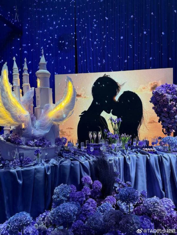 people-silhouette-A-wedding-decoration-B-blue-purple-flowers-C-castle-wings