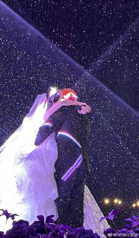 people-bride and groom-A-hugging-A-wedding setting-B-glittering/sparkling effect-C