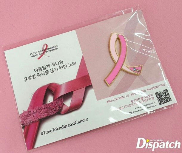 people-N/A-Estee Lauder Companies Breast Cancer Campaign-A-pink ribbon pin-B-Korean text-C-Dispatch logo