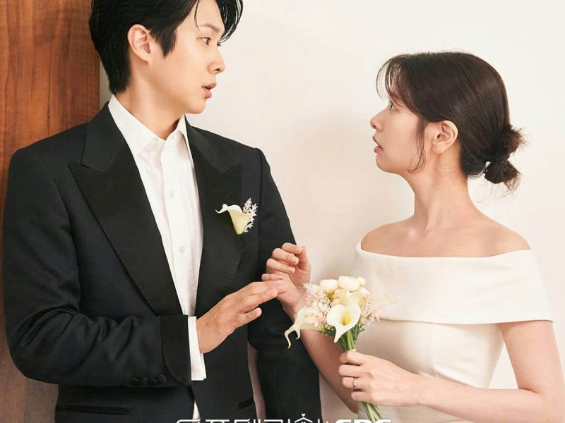 people-man and woman-A-wedding attire-B-looking at each other-C-holding hands/flowers