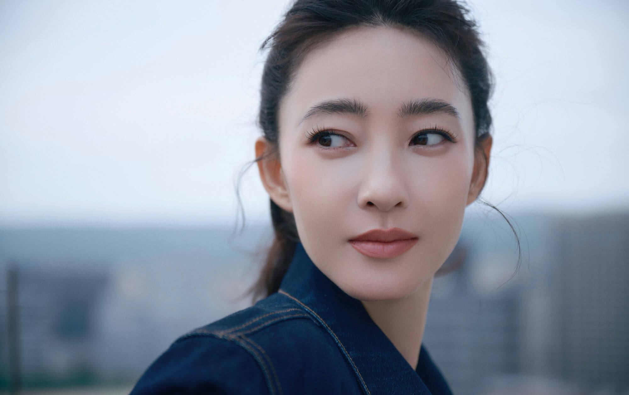 people-woman-close-up-A-denim jacket-A-looking away-B-soft lighting
