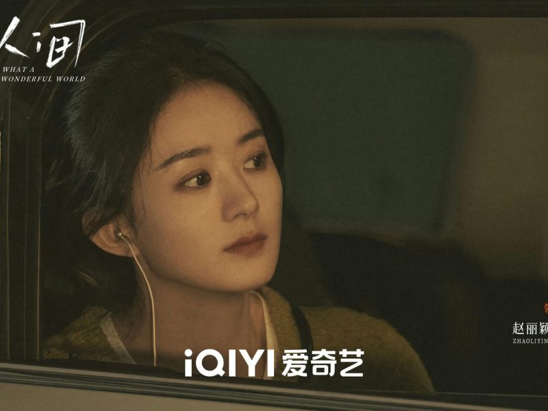 people-A-woman-A-looking away-B-in car-C-earphones