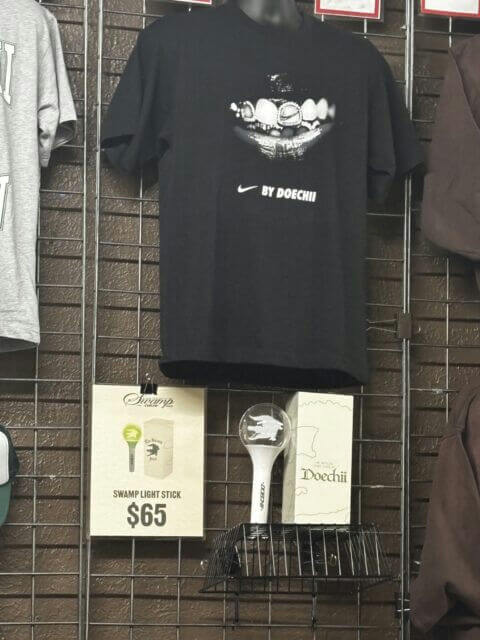 people-0-merchandise-A-shirt-B-light-stick-C-Doechii