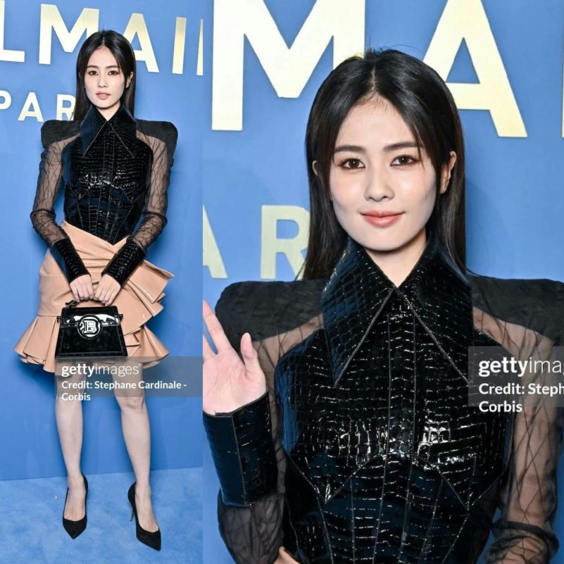 people-A-female celebrity-A-Balmain outfit-B-black shiny top-C-peach ruffle skirt